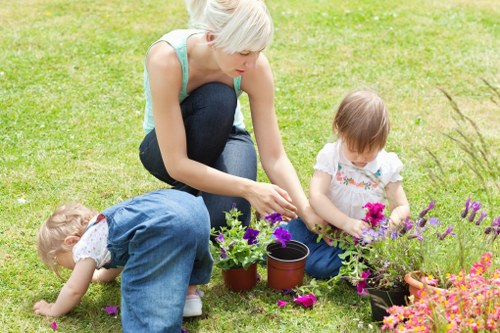 Professional garden maintenance in Woolwich for lawns, hedges, and beds